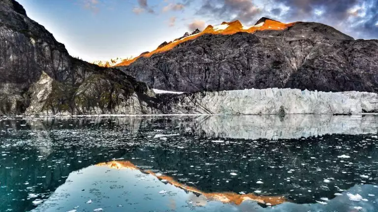 Glaciers and rugged mountains in their raw beauty abound on North to True Alaska cruise as seen in this photo