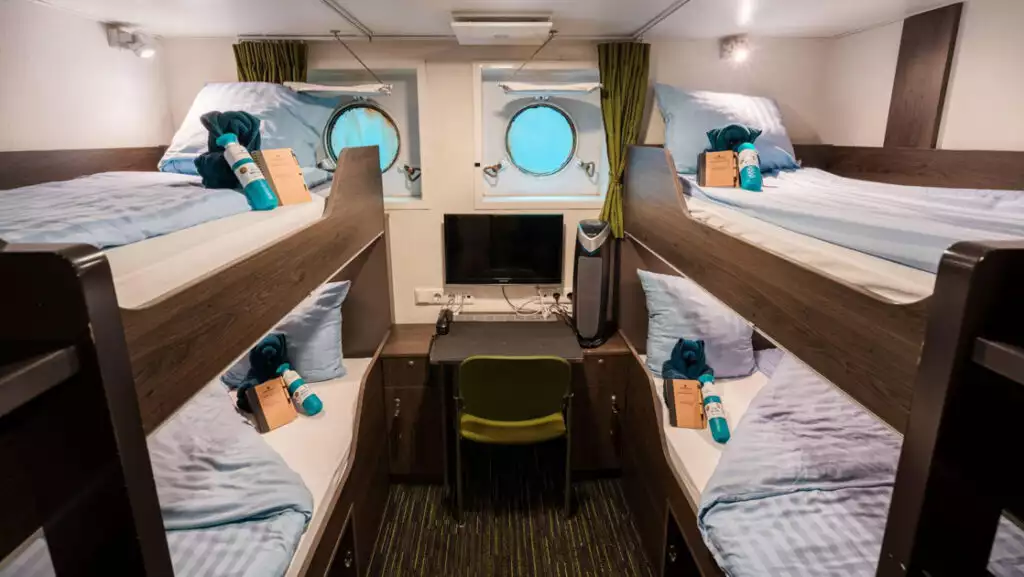 Quadruple Porthole cabin aboard Ortelius. Photo by: Olaf Kramer