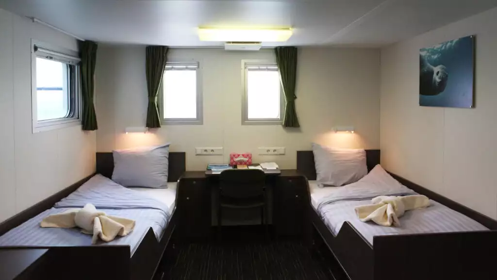 Twin Deluxe cabin aboard Oretlius. Photo by: Monica Salmang