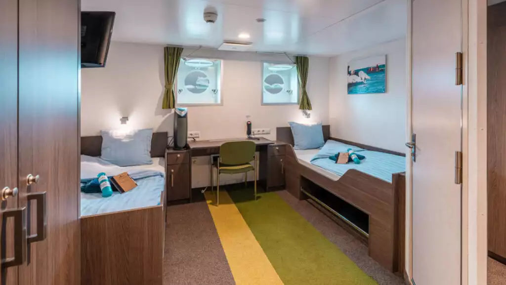 Twin Porthole cabin aboard Ortelius. Photo by: Olaf Kramer