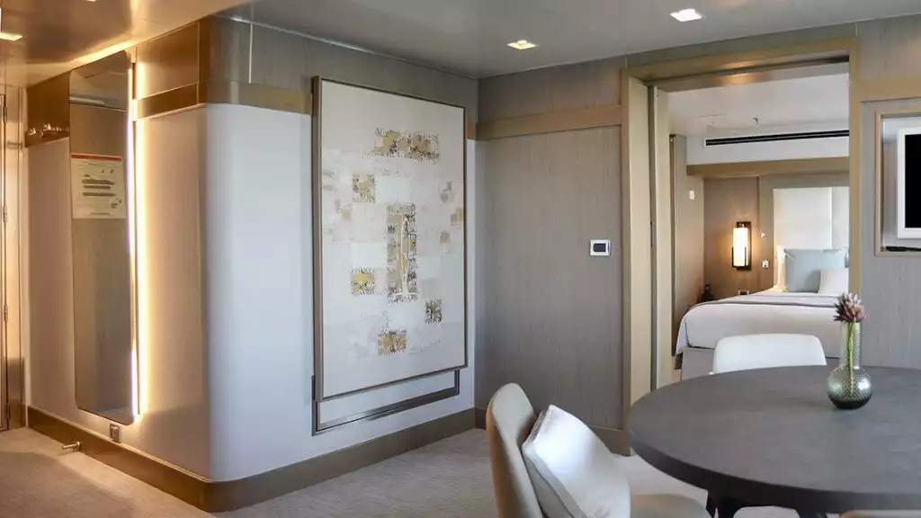 Prestige Suite - Decks 4, 5 & 6 with king bed aboard L'Austral. Photo by: Tamar Sarkissian/Ponant