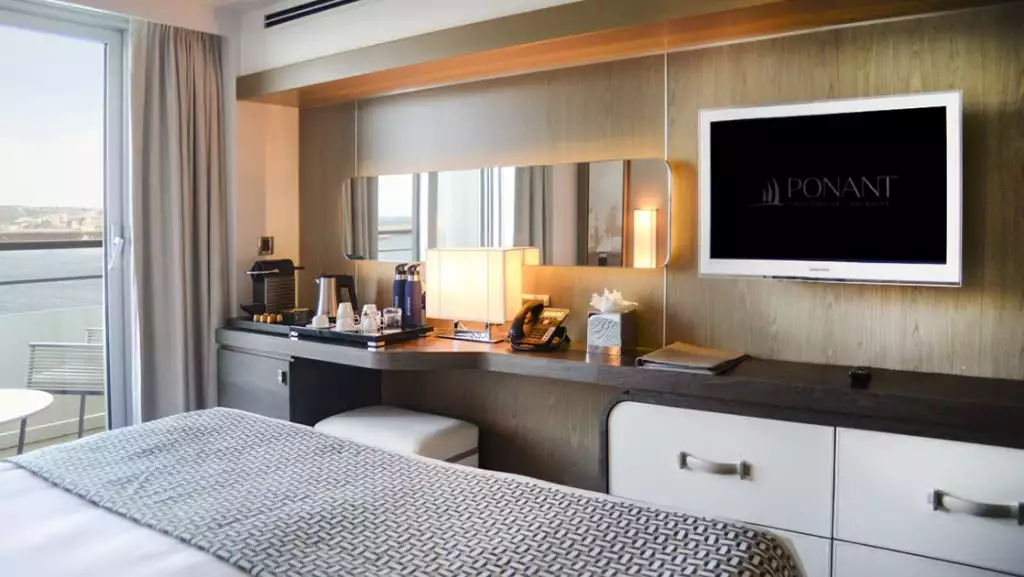Prestige Stateroom with king bed aboard L'Austral. Photo by: Tamar Sarkissian/Ponant.