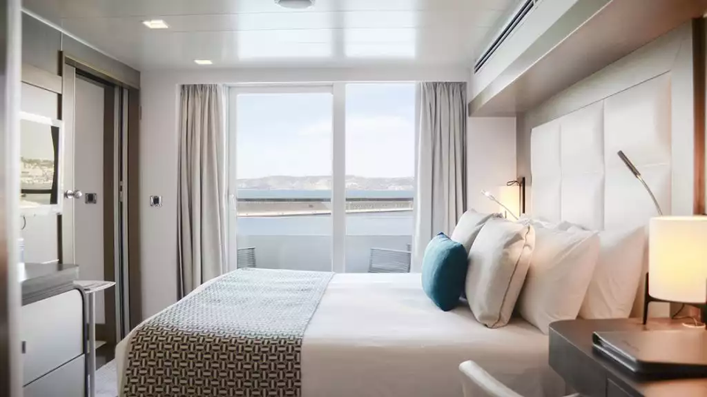 Prestige Stateroom - Decks 4, 5 & 6 with king bed aboard L'Austral. Photo by: Tamar Sarkissian/Ponant
