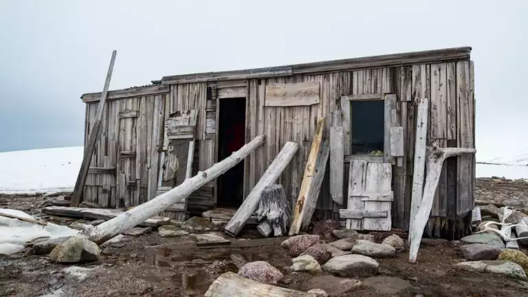 A hut left in the desolation in North Spitsbergen highlighting the harsh winters experienced here.