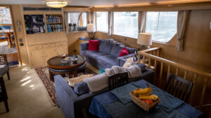 A beautiful and plush salon with views of the sea mountains glaciers and fjords as you pass this cruise aboard the Sea Star