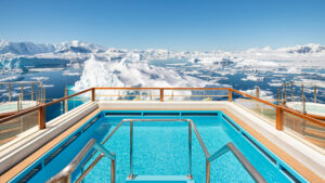 Beautiful pool overlooking icebergs of antarctica aboard small ship expedition cruise douglous mawson
