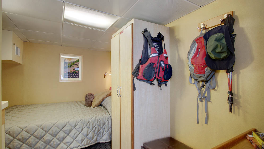Pathfinder cabin with queen bed aboard Wilderness Discoverer.