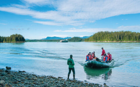 a group of adventure travelers coming ashore from the Exploring British Columbia & the San Juan Islands small ship cruise in the pacific northwest