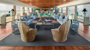 The indoor lounge offers the best comfort while cruising aboard Aqua Mekong with views of the Mekong river and countryside