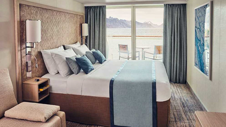 Double bed; Balcony with two chairs, a table; convertible sleeper sofa; two bedside tables and a closet with ample storage.