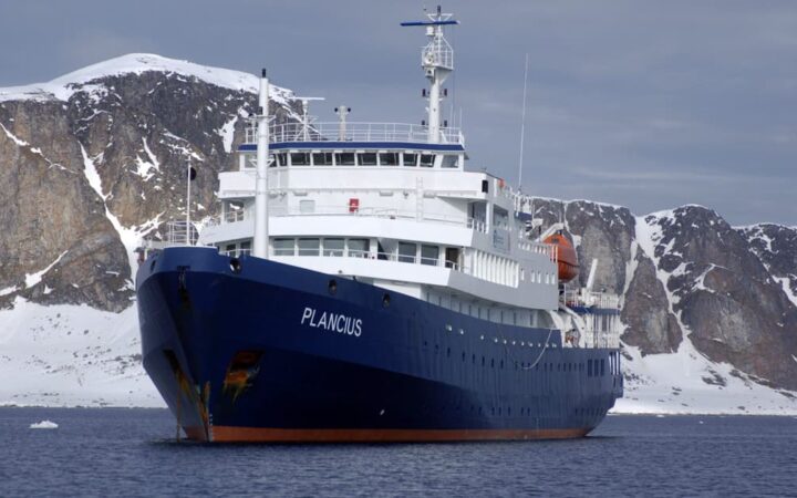 Plancius small ship cruising around Antarctica on a sunny day