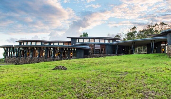 Grassy lawn and exterior of Explora Rapa Nui Lodge on Easter Island
