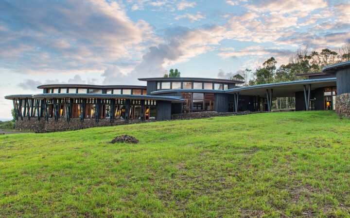 Grassy lawn and exterior of Explora Rapa Nui Lodge on Easter Island