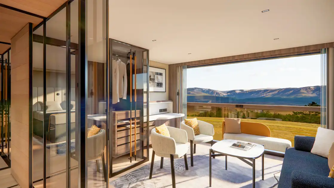 Suite on National Geographic Connect with modern wood, stone & glass decor, sash window balcony, bedroom & separate sitting room.
