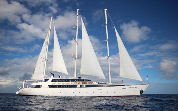 panorama Mediterranean luxury yacht in full sail on a sunny day