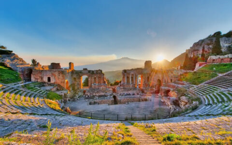 Accent Greek amphitheater built into the hill overlooking a breath taking sunset on a clear day.