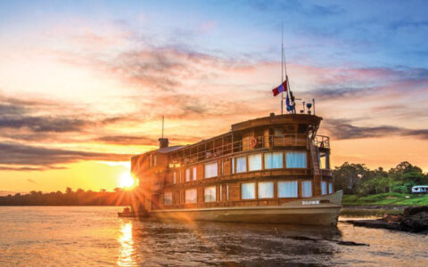 You will be aboard the Delfin II as seen here docked while with the National Geographic Upper Amazon River Cruise