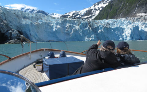 Guests view a glacier from the Sea Star yacht in Kenai Fjords National Park.