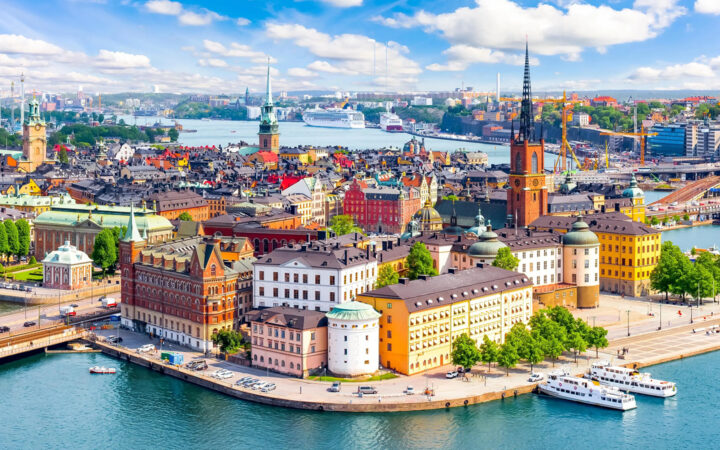 Overlook of city with colorful buildings and breathtaking landscapes in Sweden