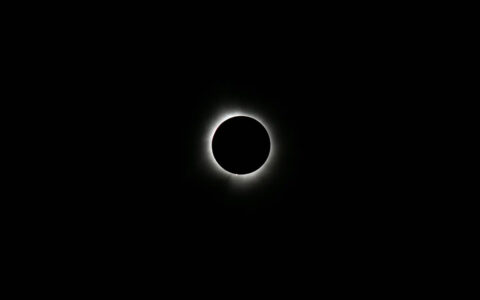 Total solar eclipse with sun fully eclipsed by the moon, resulting in complete darkness, seen on the Arctic Highlights cruise.