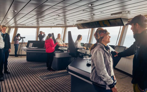 Adventurists explore the captains quarters and control room as they look out into the icy snowy landscape