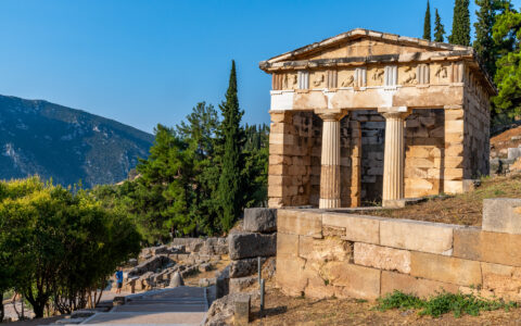 Doric-style Athenian Treasury at UNESCO World Heritage in Delphi, Greece during Dalmatian Coast & Ionian Sea small ship cruise.