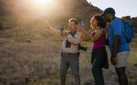 Rich Reid with Guest teaching them how to take better photos with an dslr and Iphone in Baja