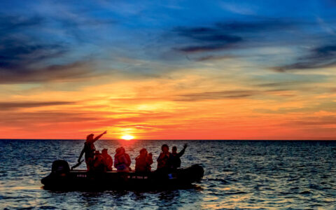 Guests enjoy a sunrise zodiac cruise in Isla Espiritu Santo Archipelago National Park, Gulf of California, Mexico.