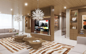 Common area lounge with a striped brown and white rug, TV and white coral like chandeliers aboard Galapagos Eminence catamaran